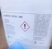 A white container with a warning label

Description automatically generated